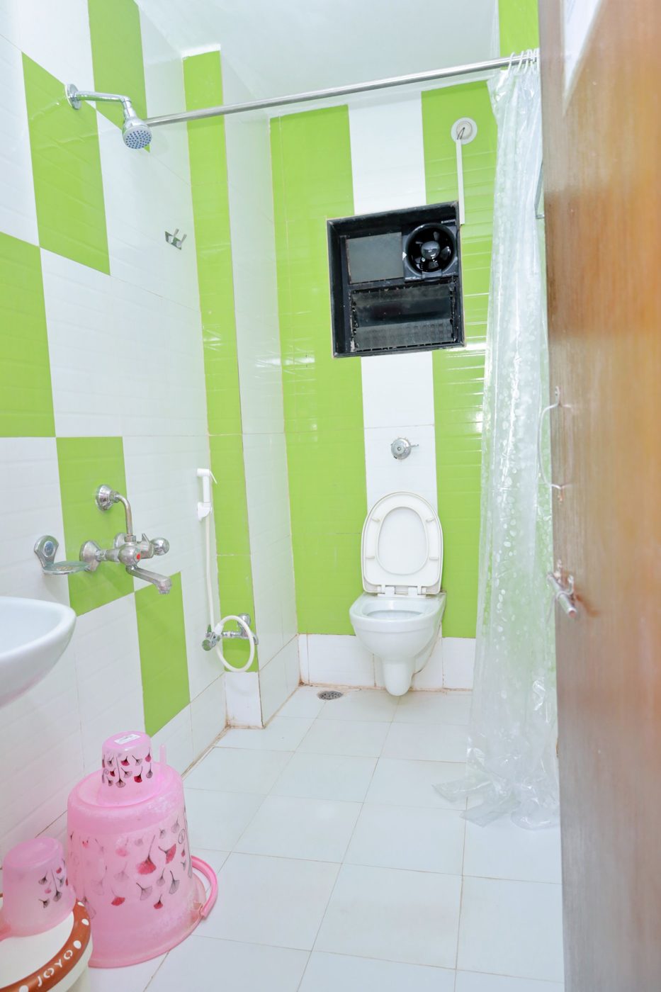 Attached bathroom with western toilet and hot water