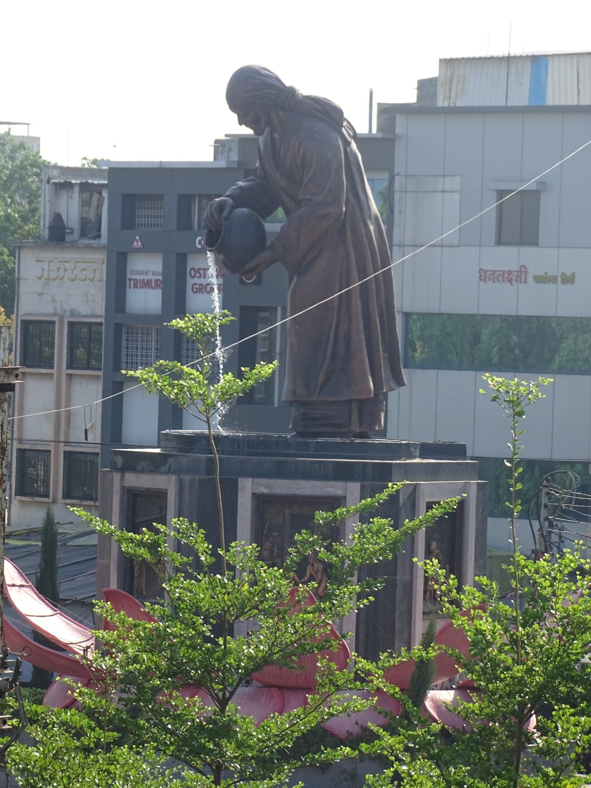 Shri Saibaba statue near the Samadhi Mandir, seen from the hotel